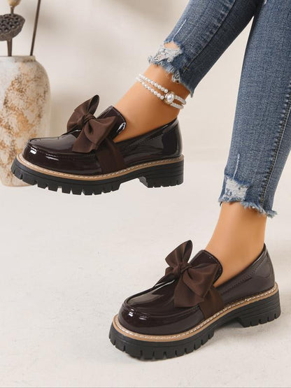 Simple Artisan loafers with bow detail for women | Chelsea