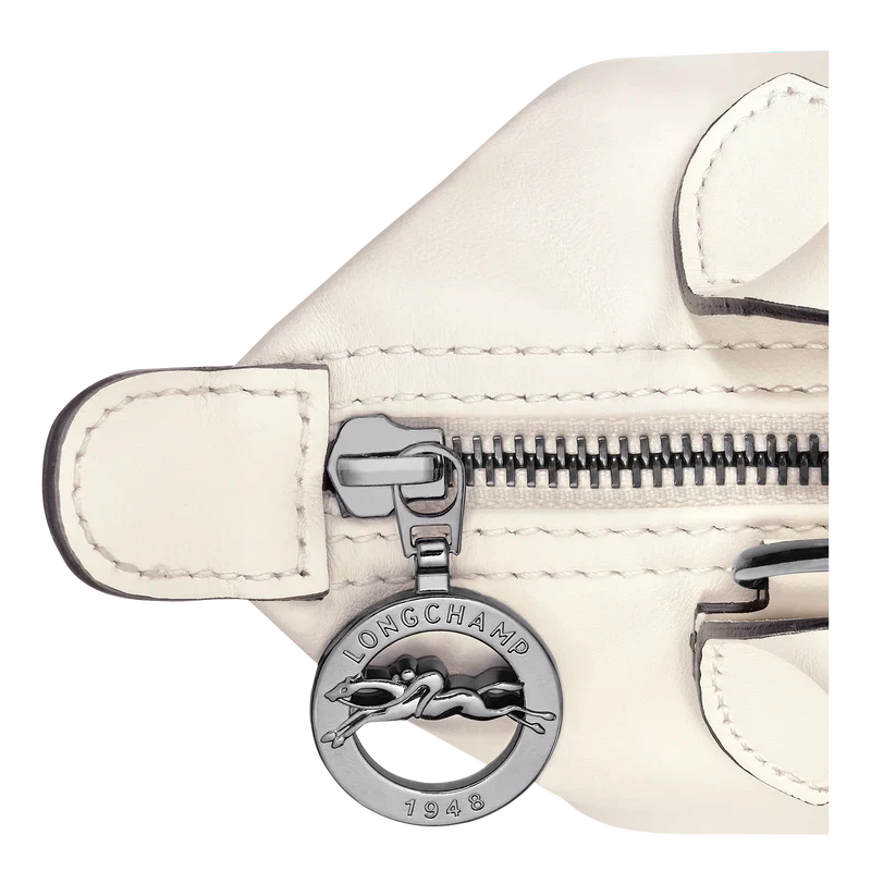Caching Le Pliage Xtra XS leather bag for women | Longchamp